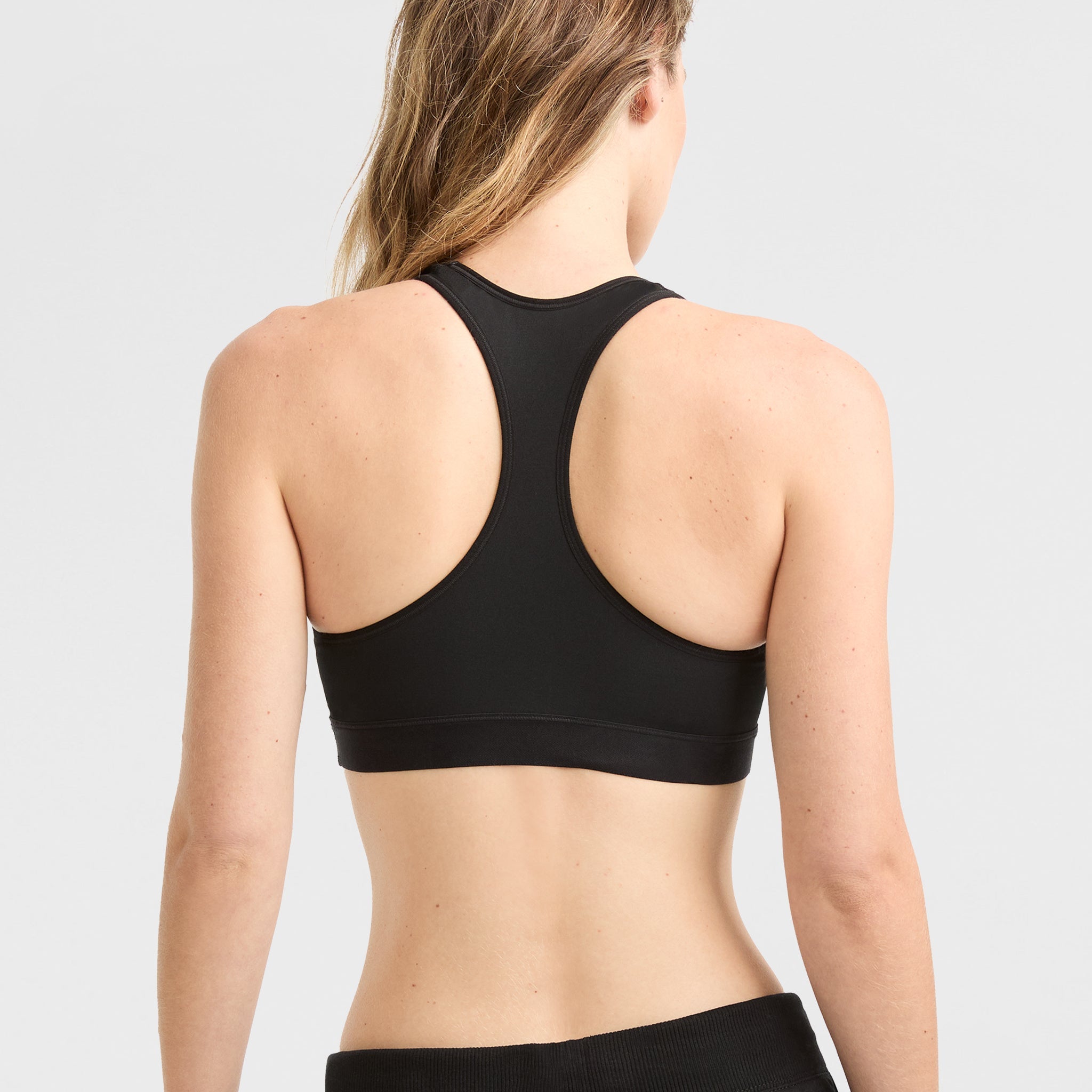 Women's Compression Sports Bra - Moisture-Wicking & Racerback Design