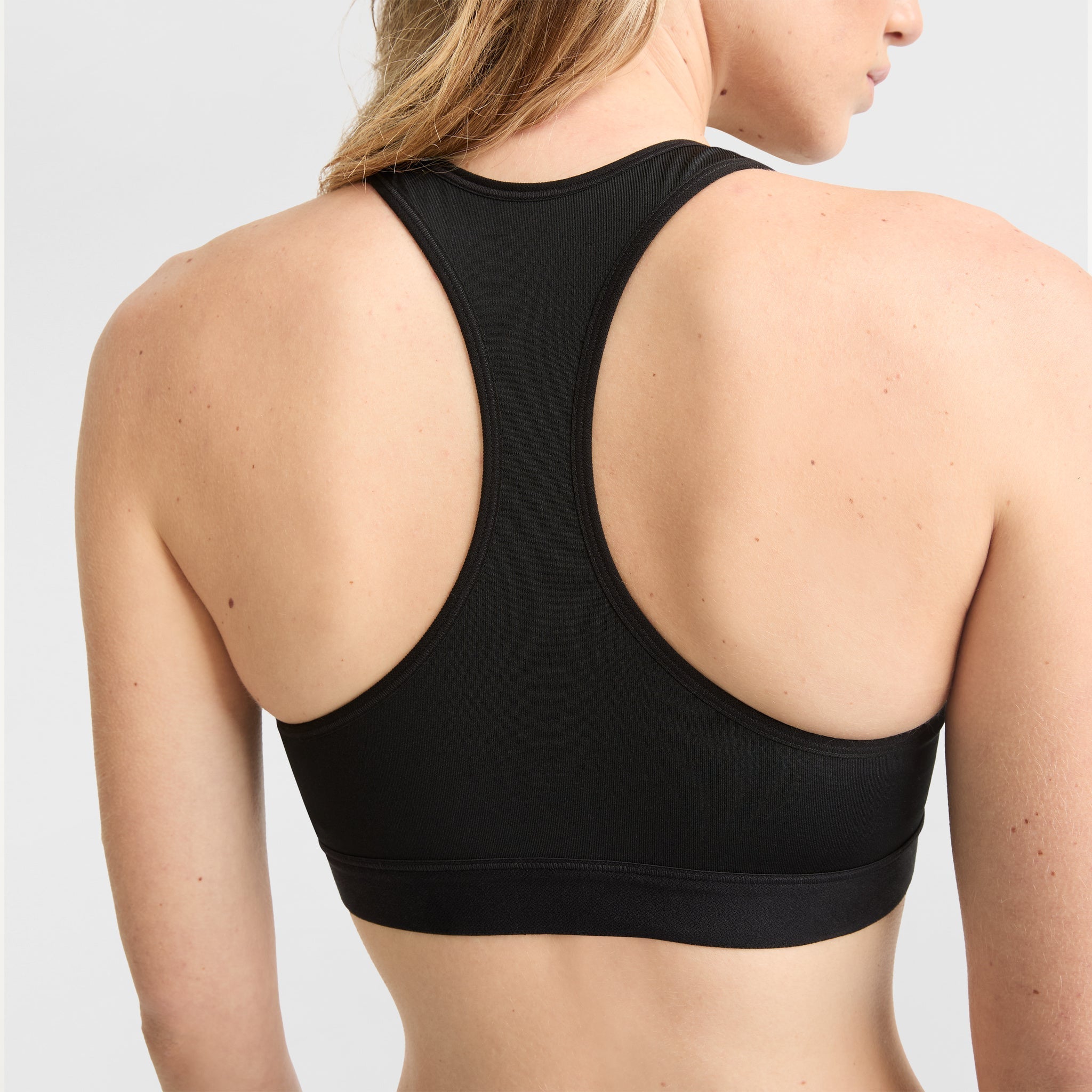 Women's Compression Sports Bra - Moisture-Wicking & Racerback Design